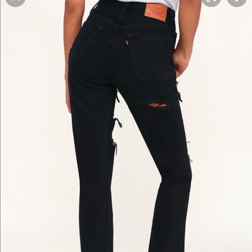 Black distressed Levi’s 501